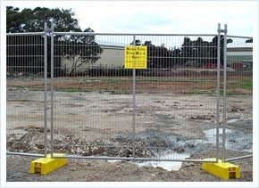 Temporary fence panels installed around a construction area