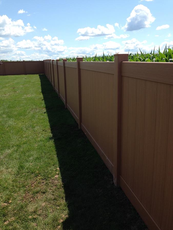 Vinyl privacy fence creating a clean property boundary
