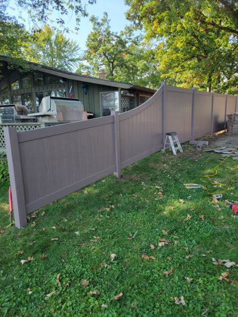 Vinyl fence line around a residential yard