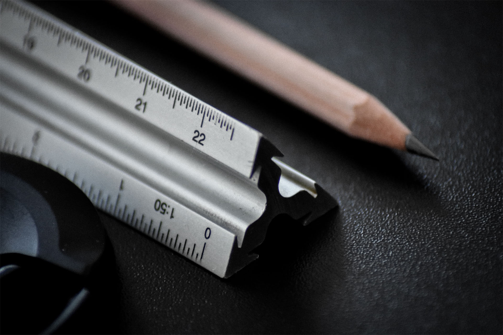 Close-up of measuring tools and a pencil representing documented repair planning